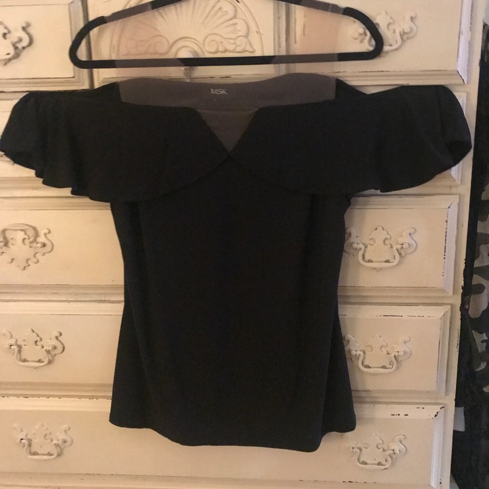 Black top with nude shoulders
